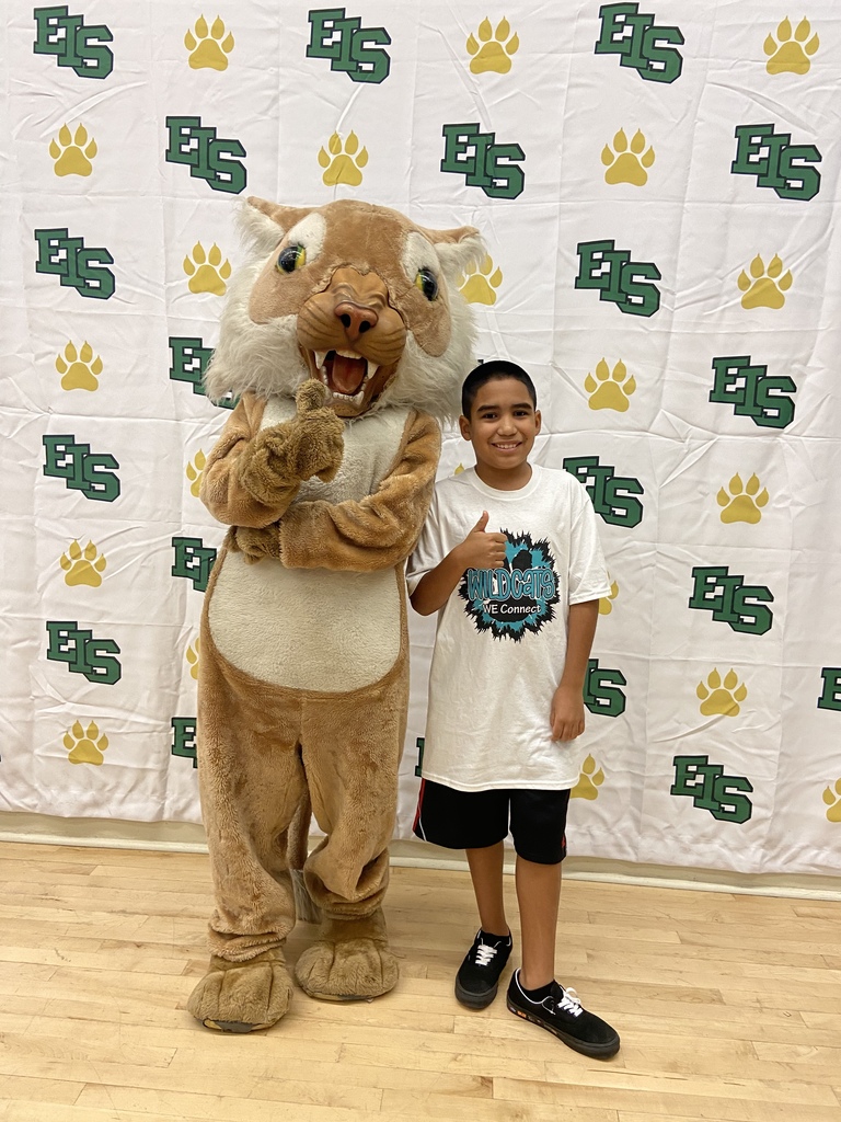 student with mascot