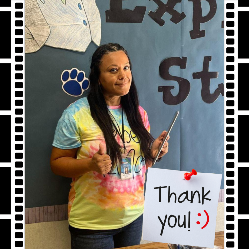 Text: Thank you Photo: teacher standing in front of classroom